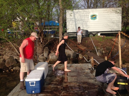 Dk loading coolers Jody in bckground