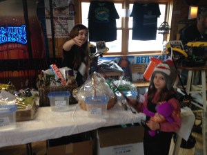 wft ice fishery kid with pole and stuffed animal